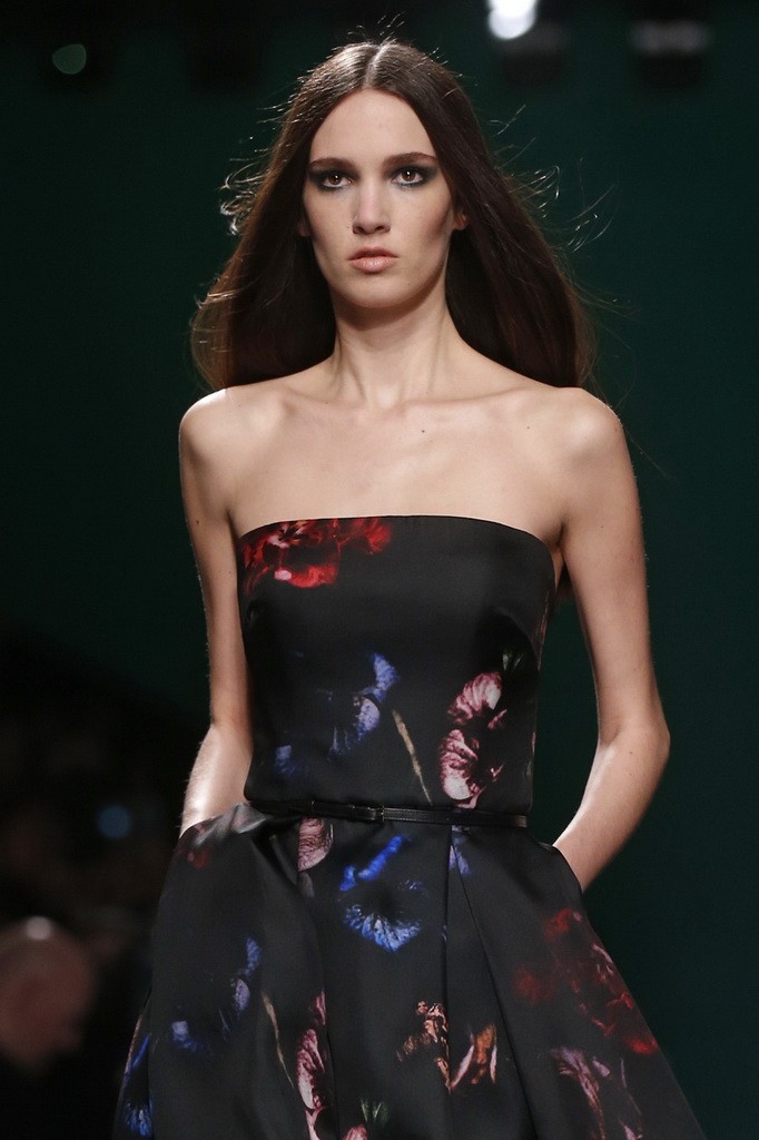 A model presents a creation by Lebanese designer Elie Saab as part of his Fall/Winter 2014-2015 women's ready-to-wear collection show during Paris Fashion Week