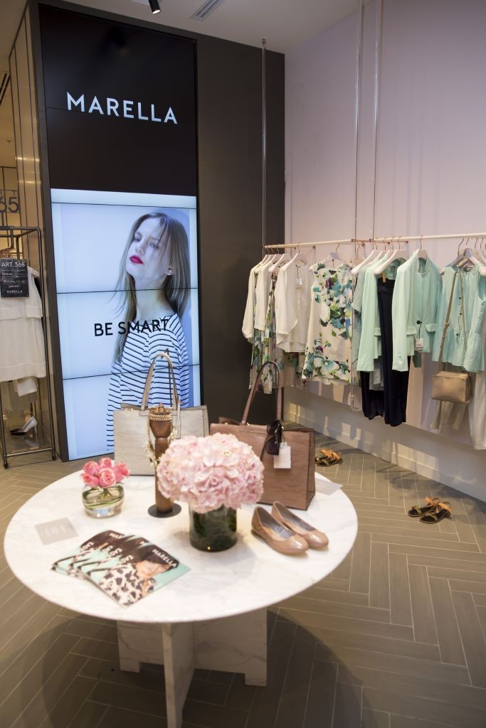 resized_Marella in-store with screen