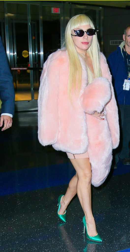 Lady Gaga Jets Out of New York Wearing a Baby Pink Fur Coat & Emerald Green Heels