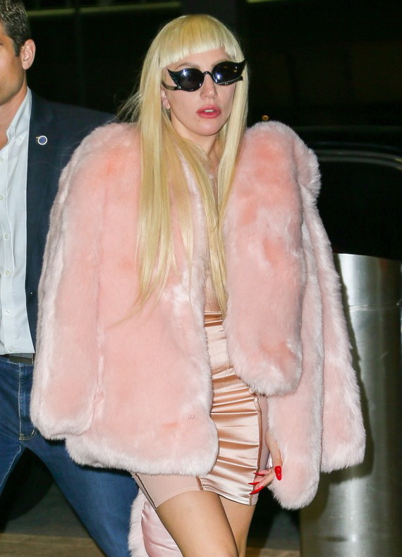 Lady Gaga Jets Out of New York Wearing a Baby Pink Fur Coat & Emerald Green Heels