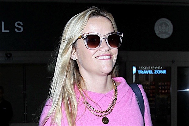 Reese Witherspoon has a beautiful smile leaving LAX Airport **USA ONLY**