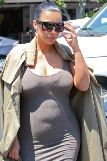 Pregnant Kim Kardashian shows off her growing belly at Fred Segal