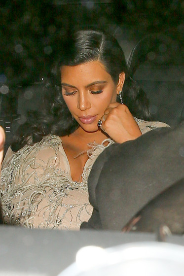 Kim Kardashian has a late night after spending the evening at mom's 60th Birthday Party