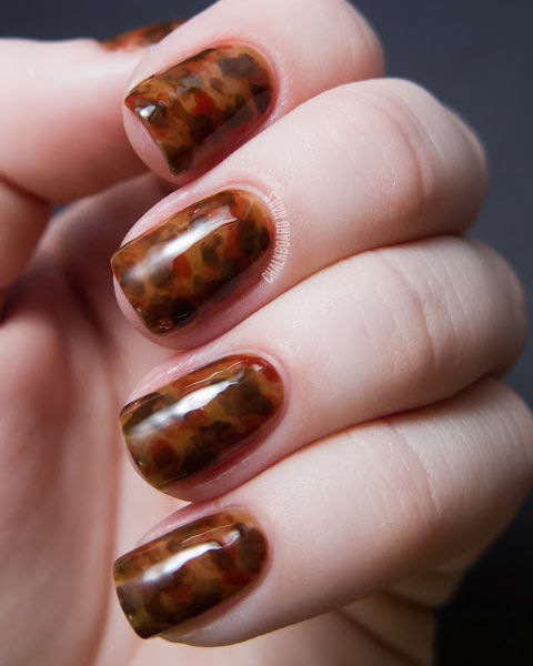 gallery-1441207655-tortoiseshell-nail-art