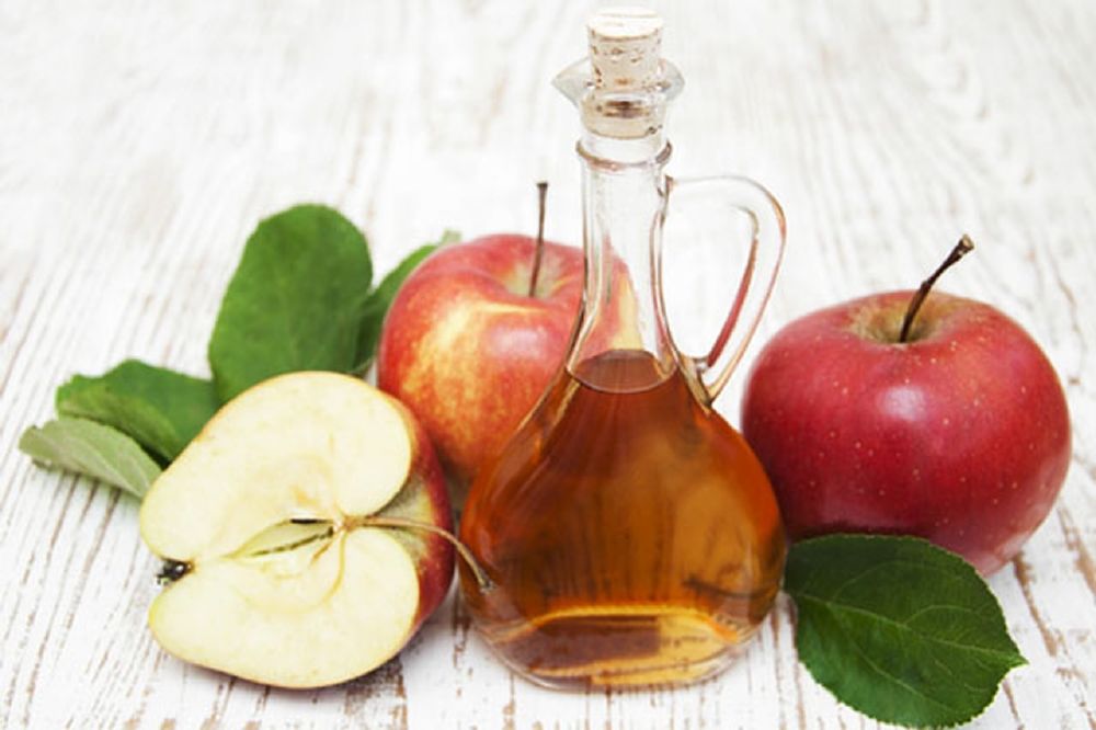 خل التفاح لعلاج ارتجاع حموضة المعدة