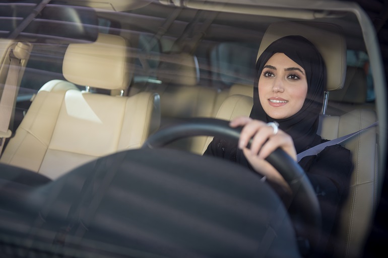 Arab woman driving.