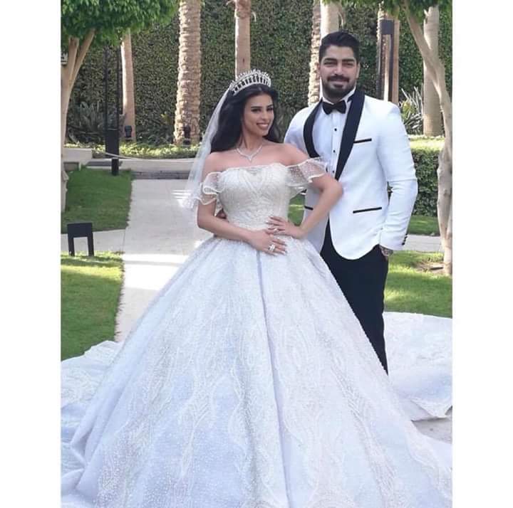 مينا عطا وزوجته