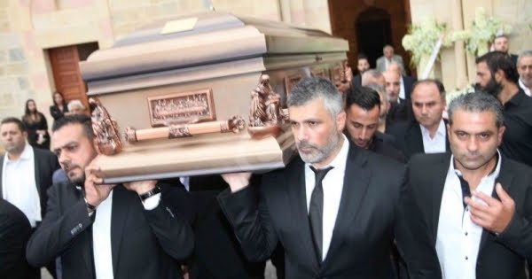 فارس كرم في عزاء والده