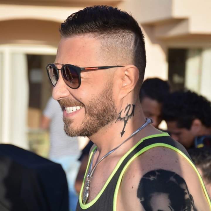صور أحمد زاهر بالتاتو