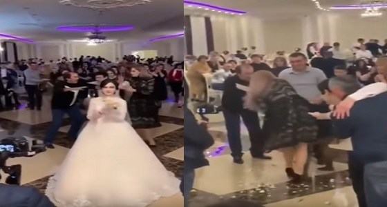 بالفيديو.. معركة شرسة بين فتاتين بسبب باقة زهور العروس