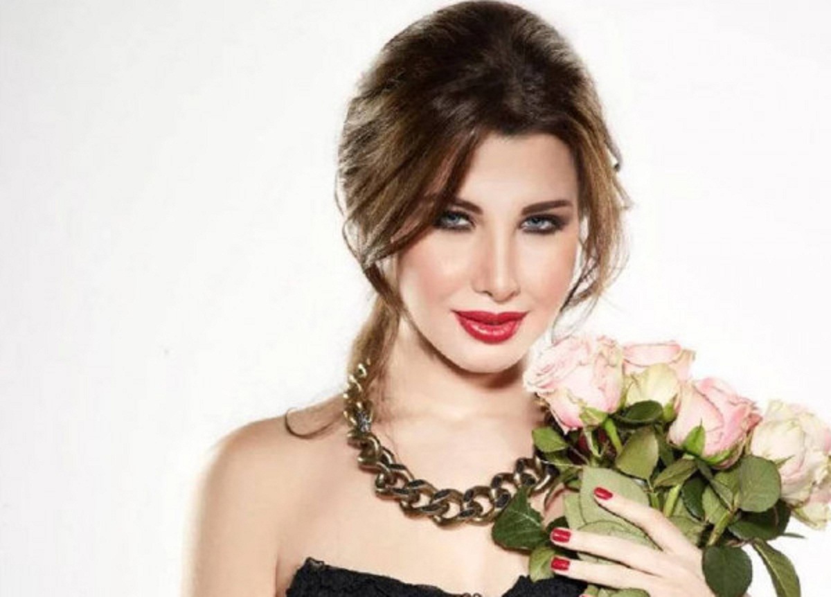 صور نانسي عجرم وبناتها