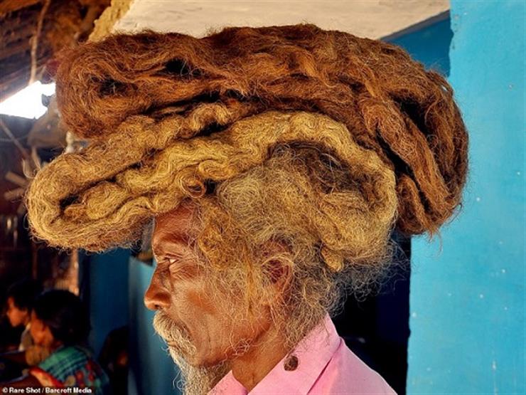 بالصور.. رجل لم يغسل شعره أو يقصه منذ 40 عاماً