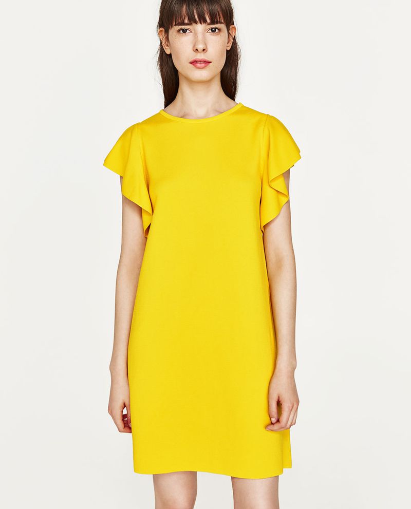فستان سهرة قصير من اللون الأصفر