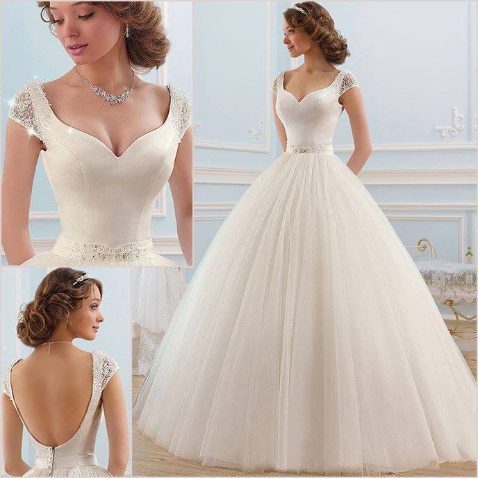 فستان زفاف منفوشة باللون الأبيض